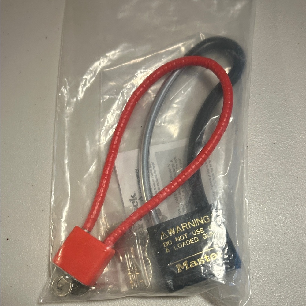 Set of 2 gun locks, Master Lock and Red Cable lock